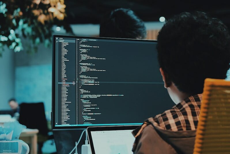 boy in front of computer monitor