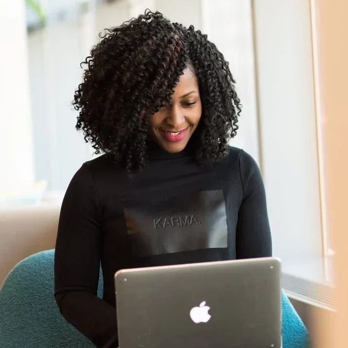 Data Science Core 1 Black woman on laptop taking our data science core course at Zindua